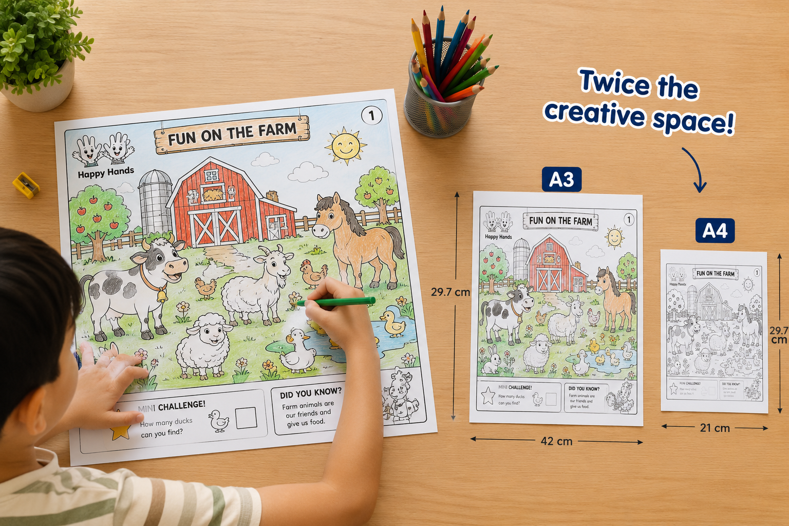 Comparison of giant A3 colouring page beside a standard A4 sheet
